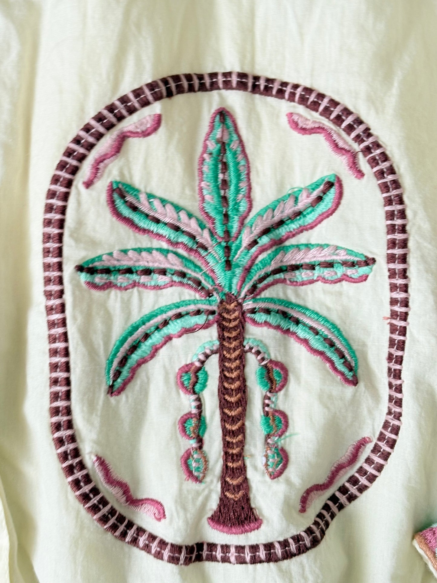 Yellow embroidered shirt