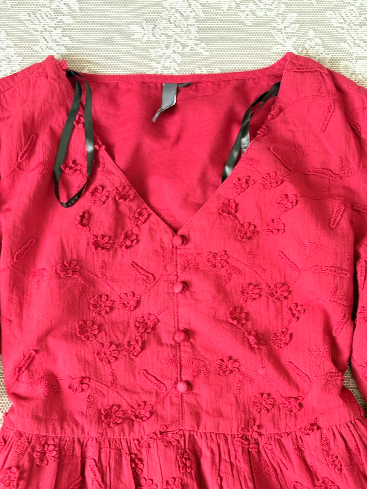 Red applique top