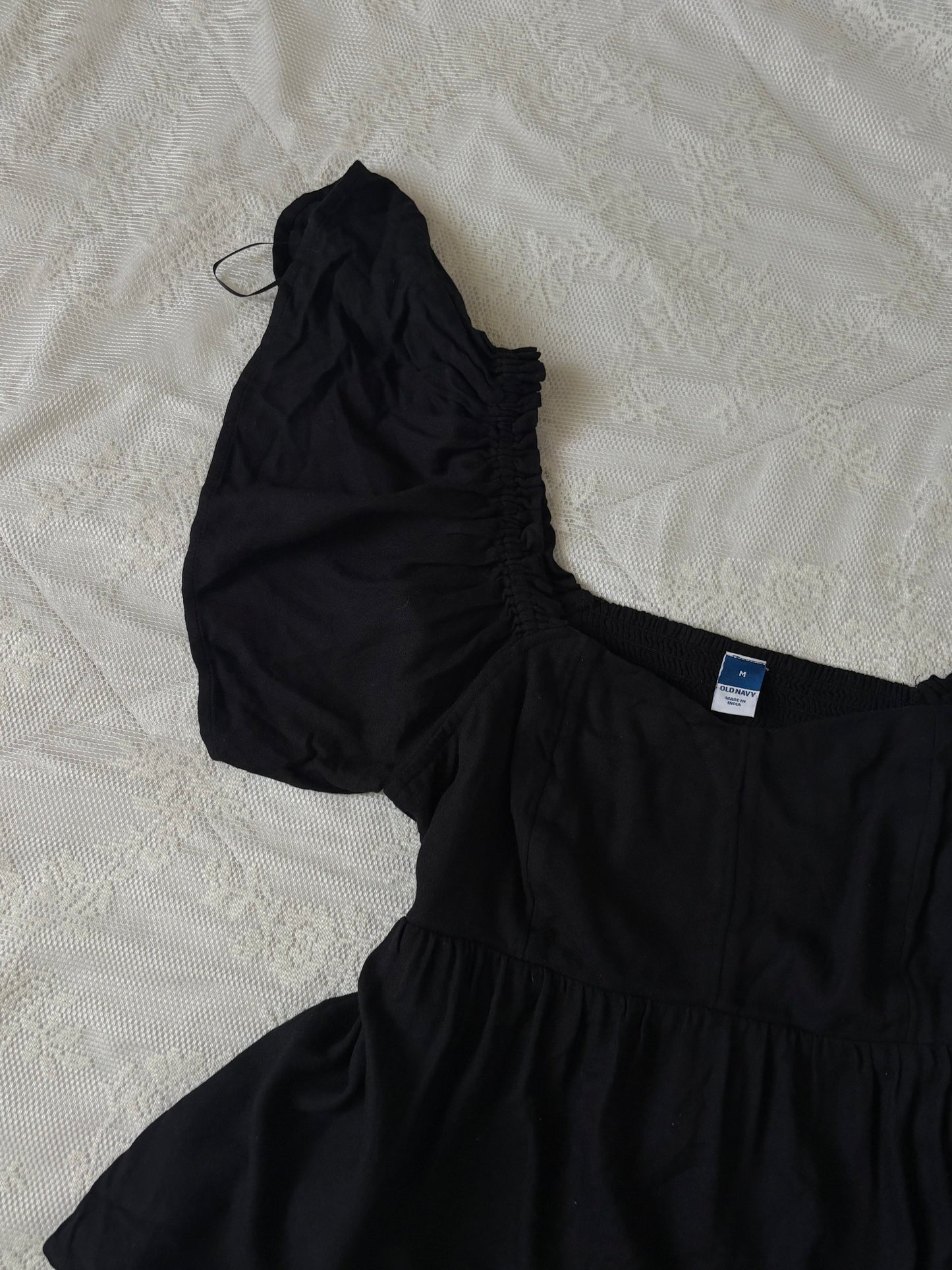 Black doll top