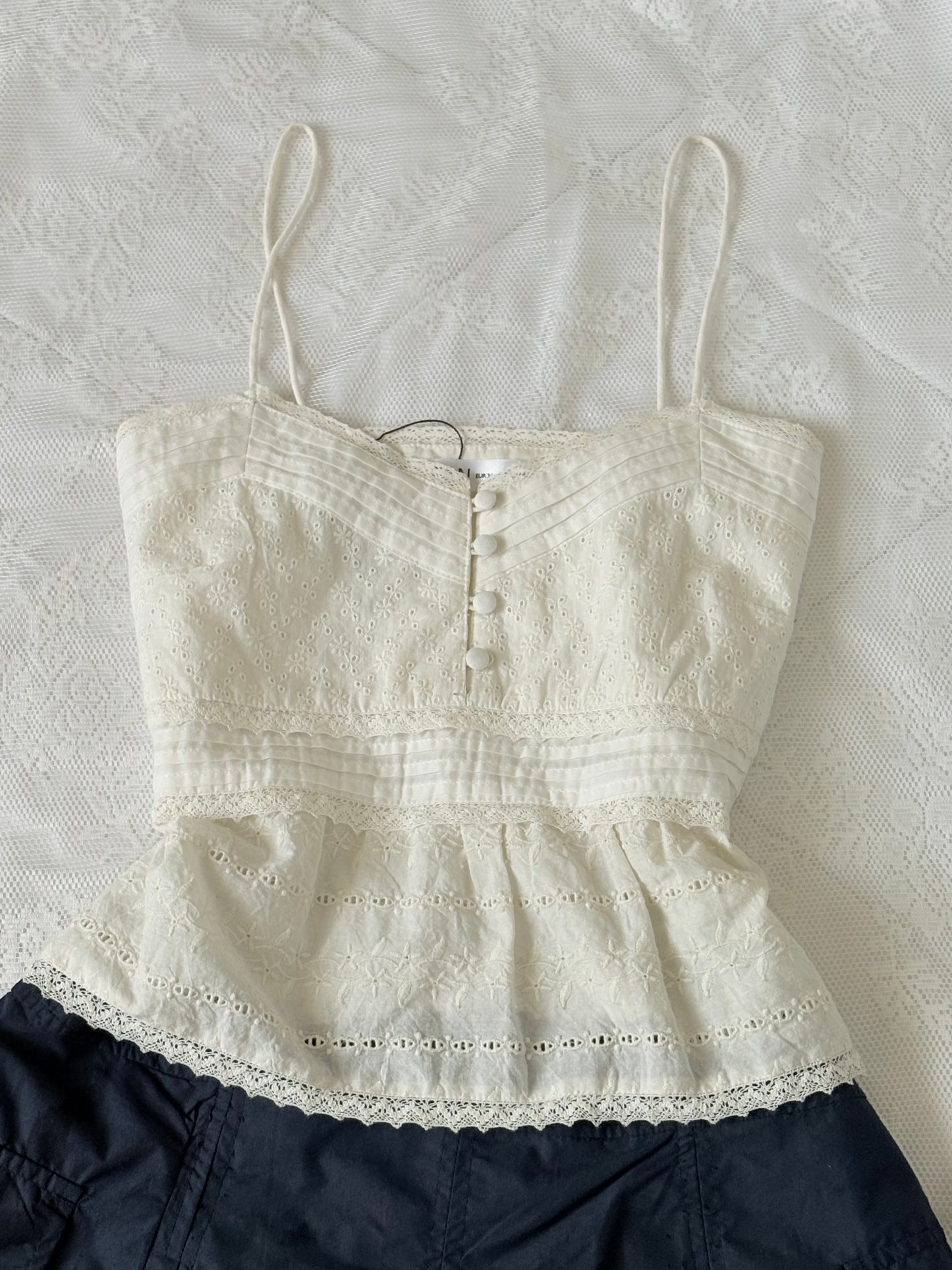 White eyelet top