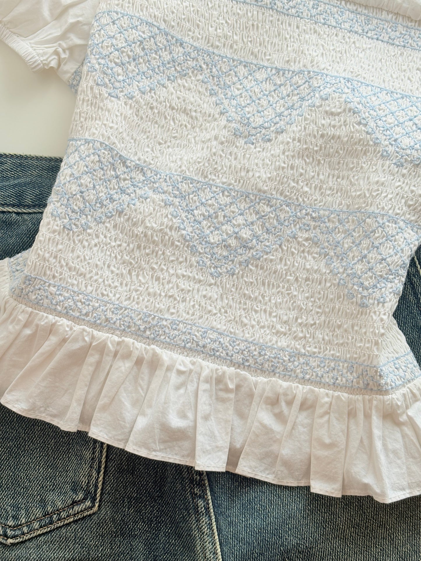 Blue white smocked top