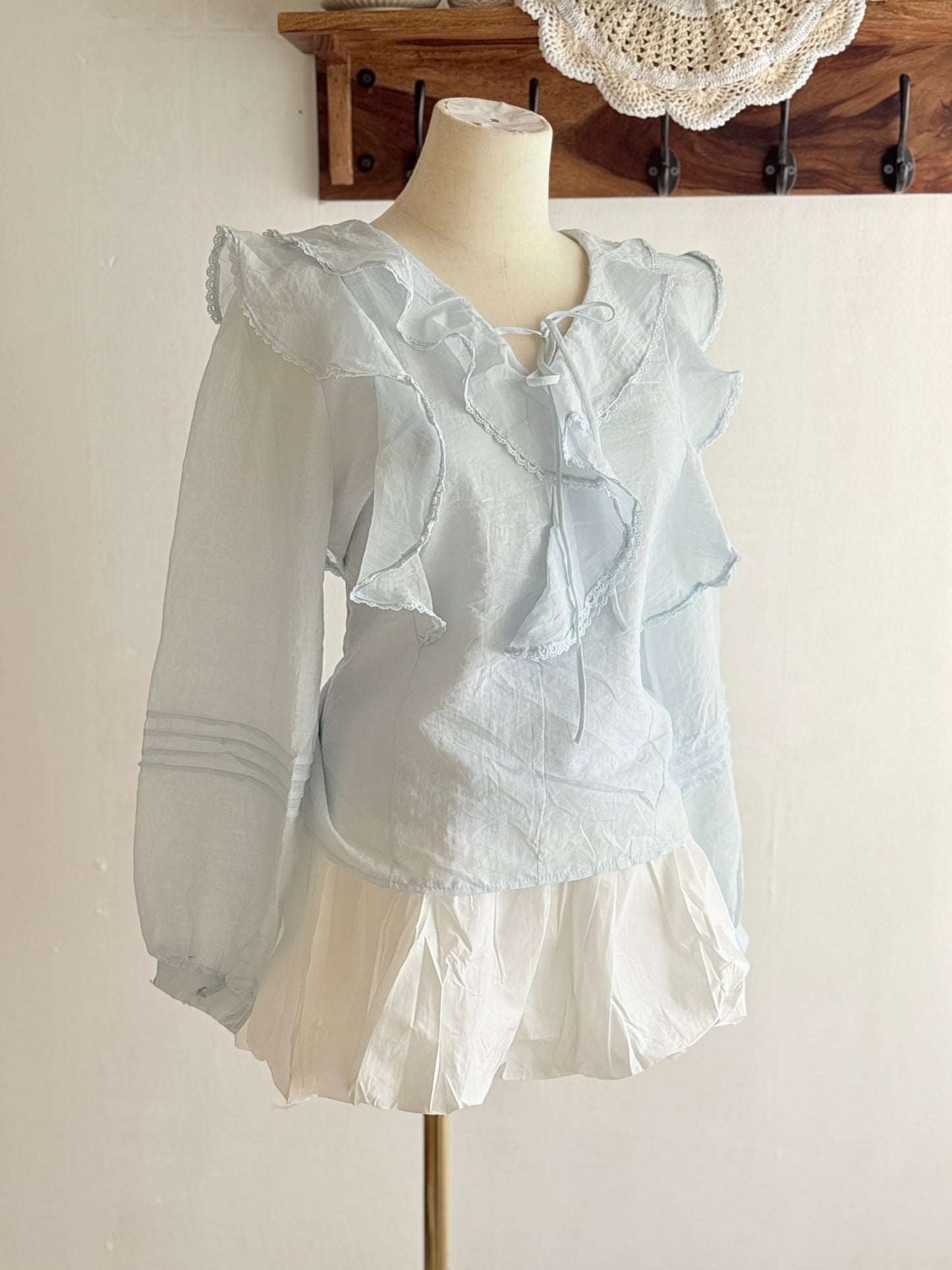 Blue ruffle top