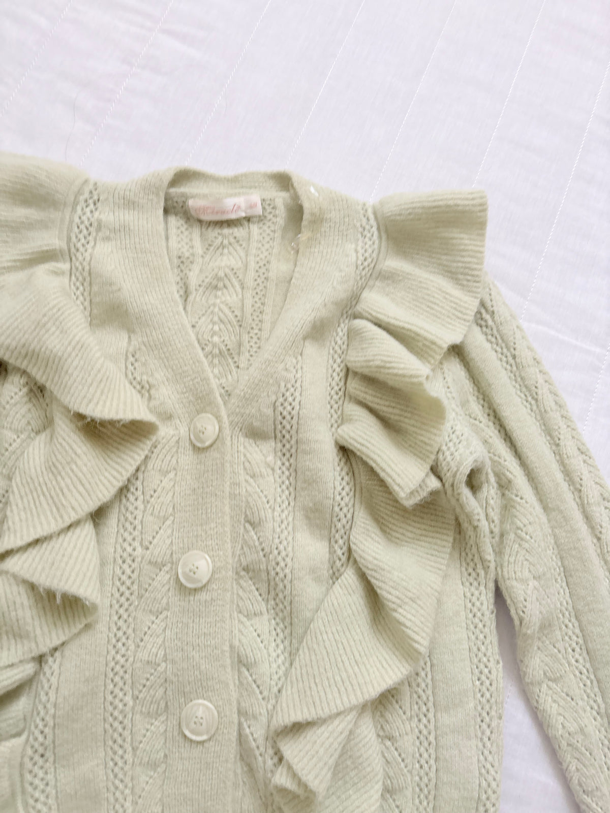 Green ruffle cardigan