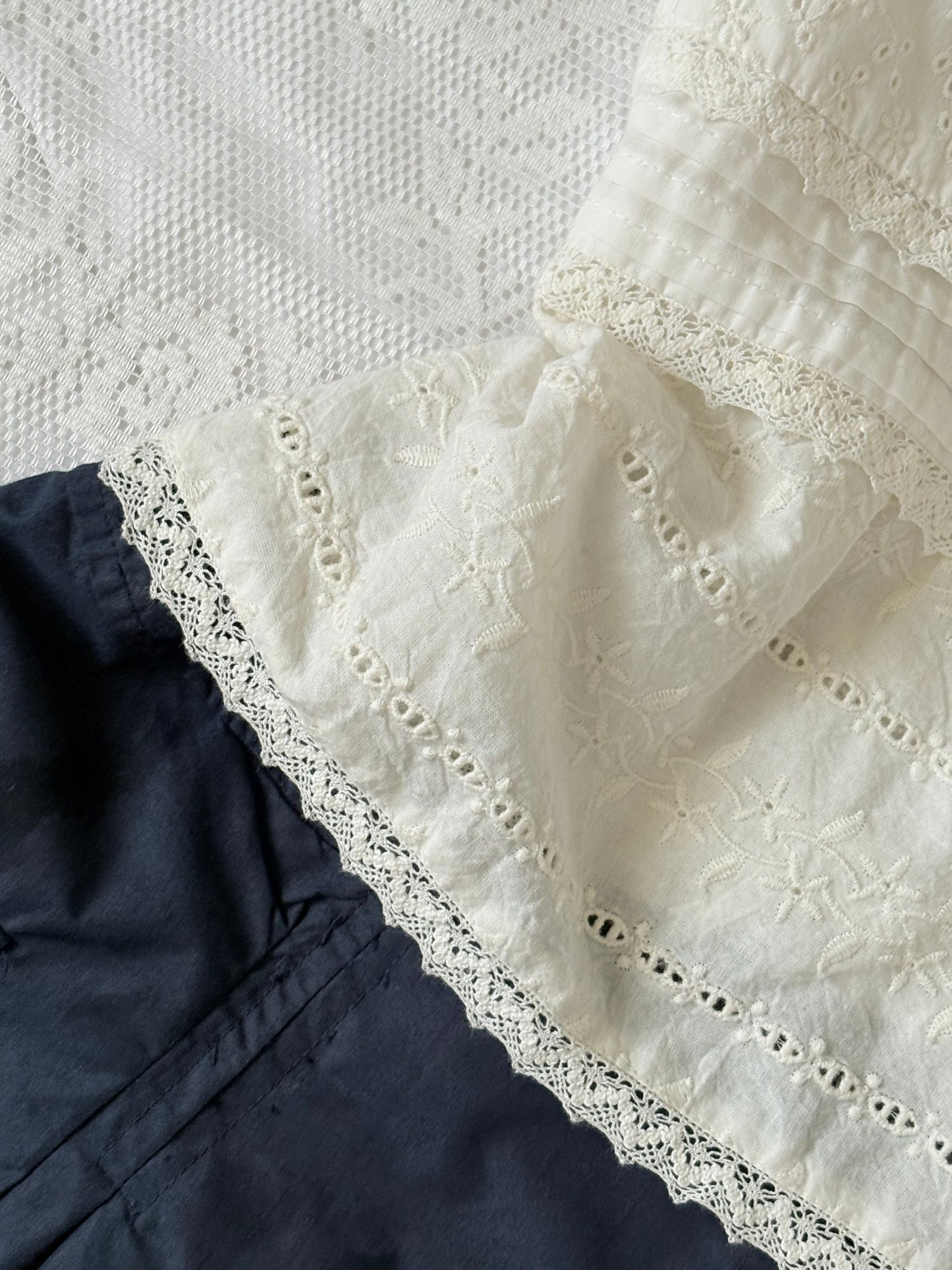White eyelet top