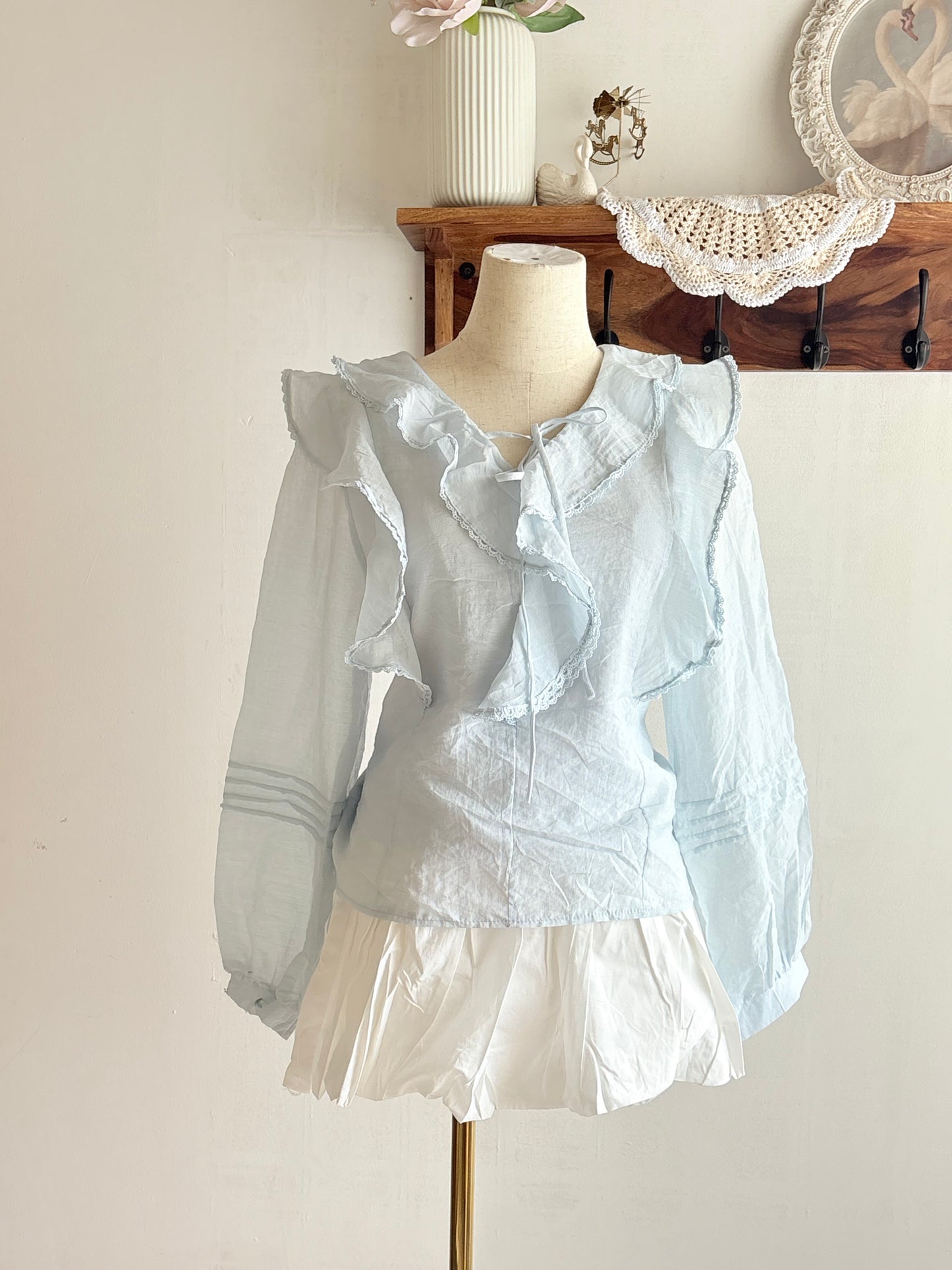 Blue ruffle top