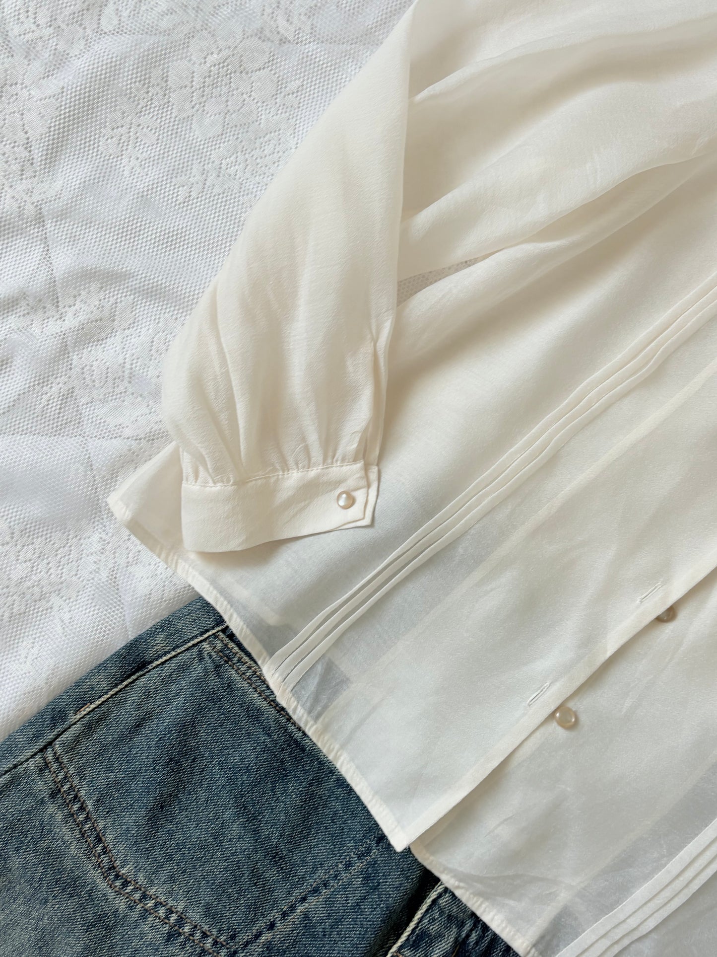 Cream buttoned top