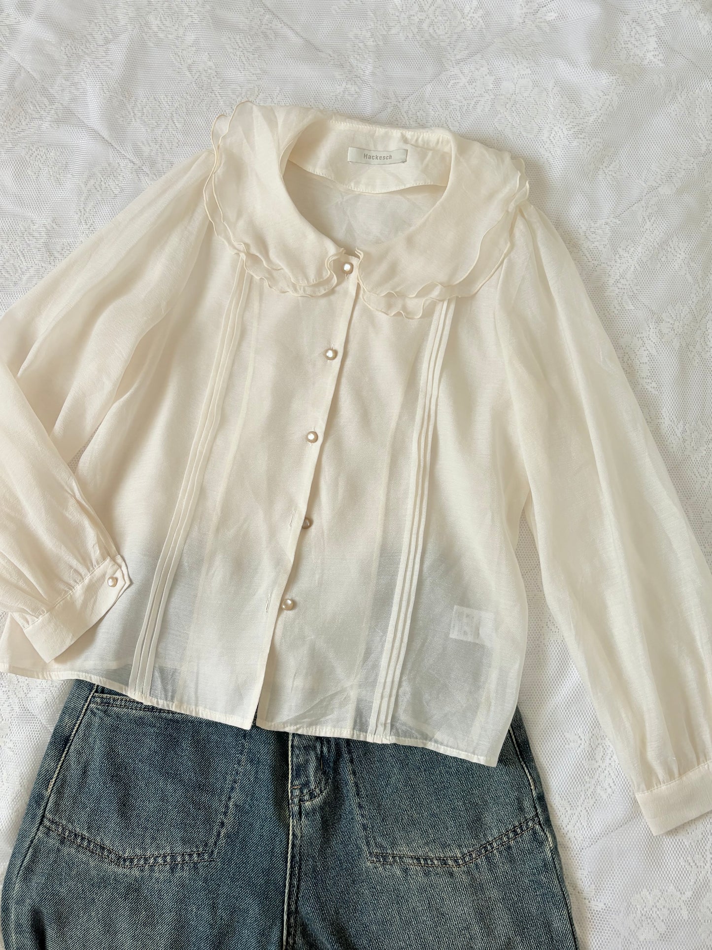 Cream buttoned top