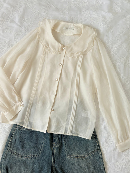 Cream buttoned top