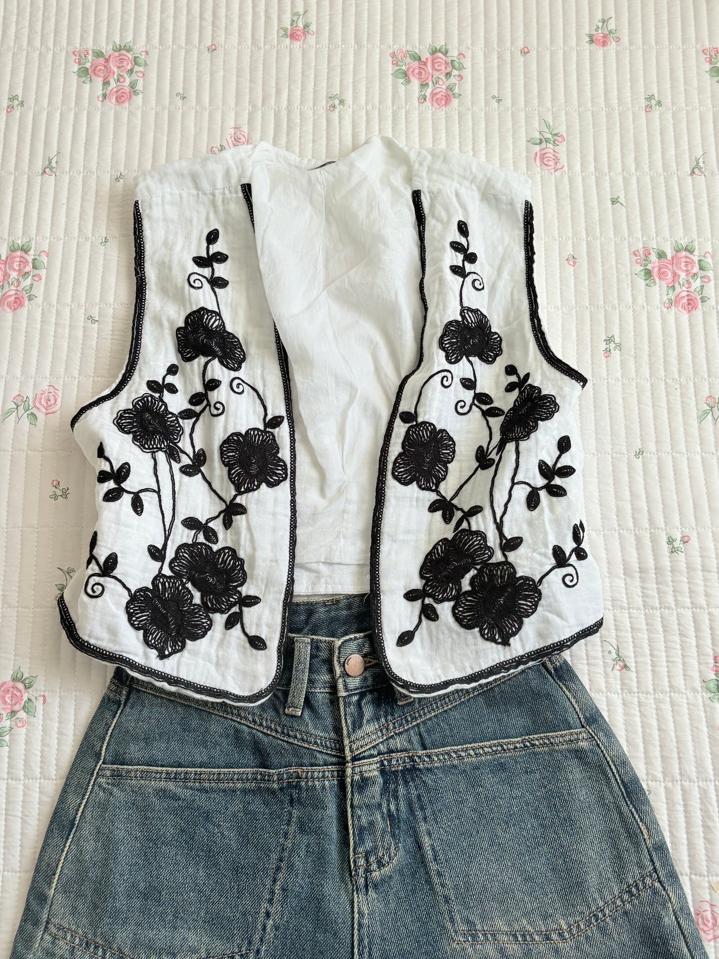 B/w embroidered vest