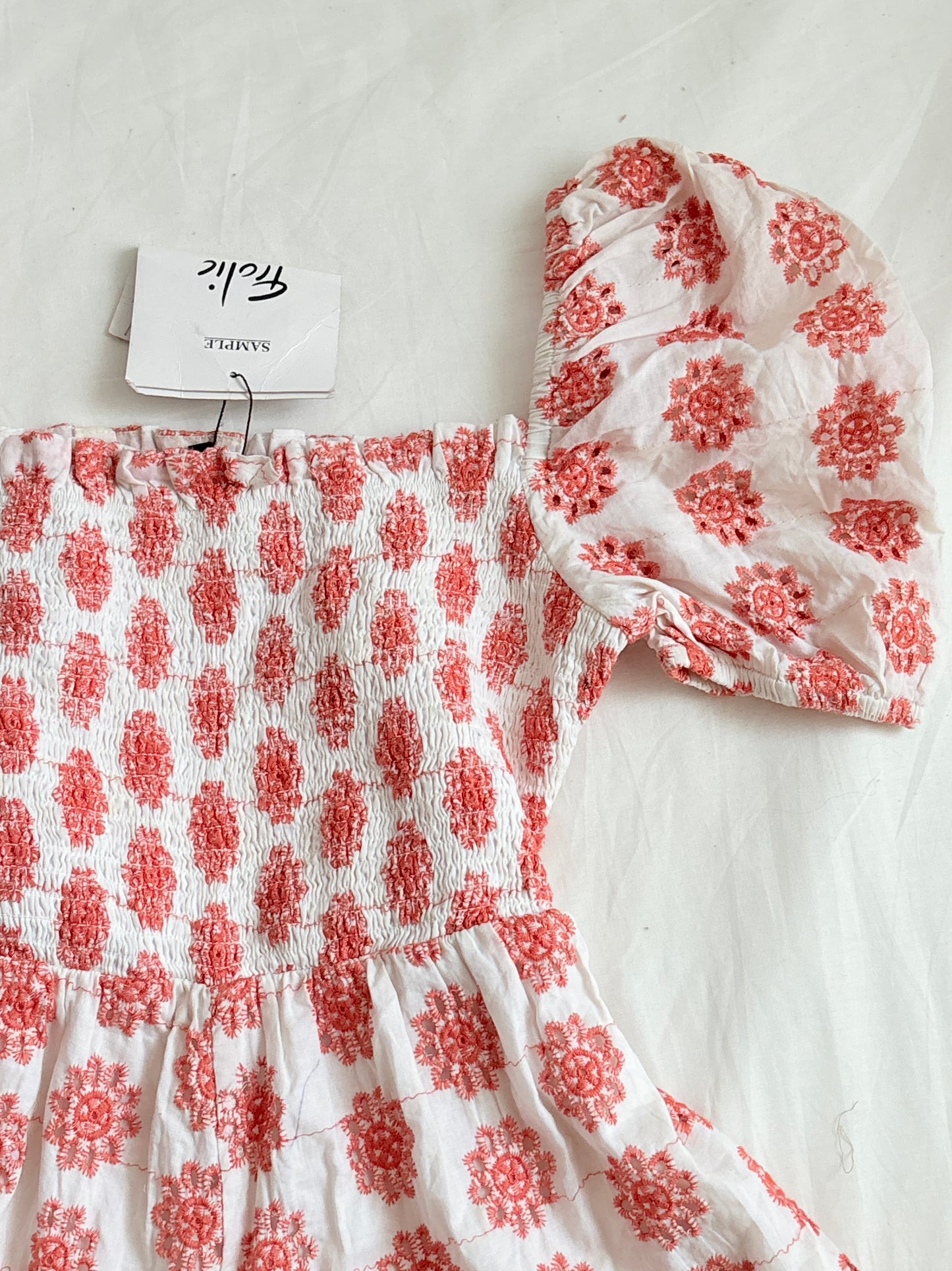 Orange eyelet romper