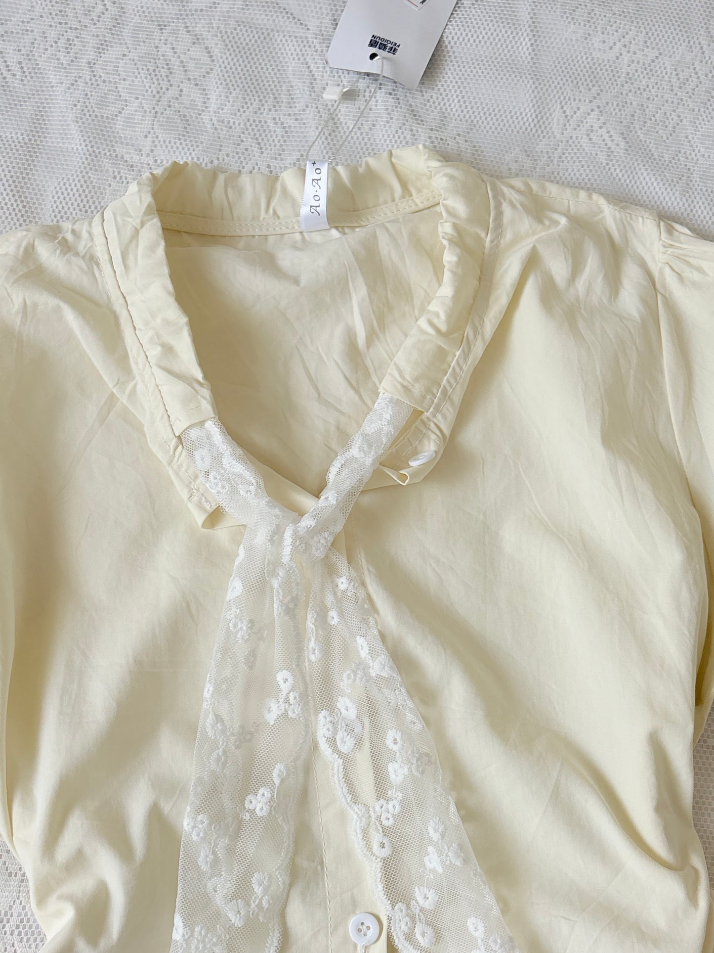 Yellow lace tie