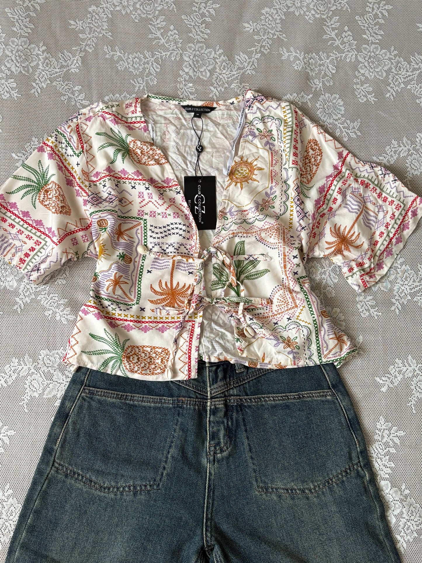 Tropical tie top