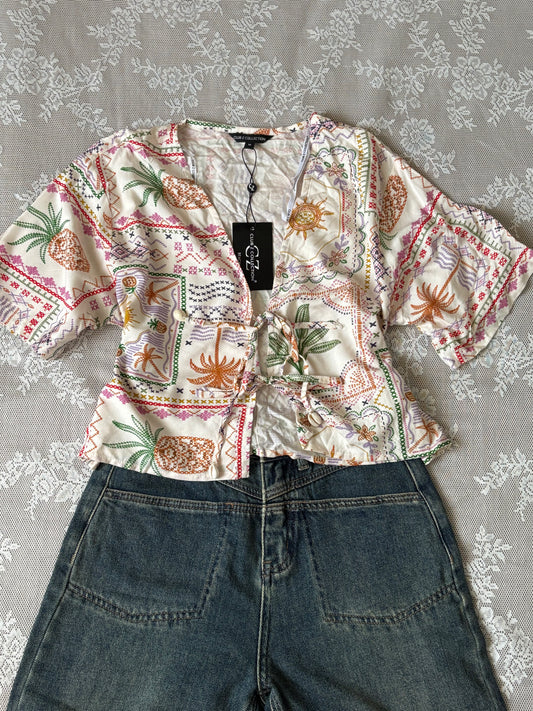 Tropical tie top