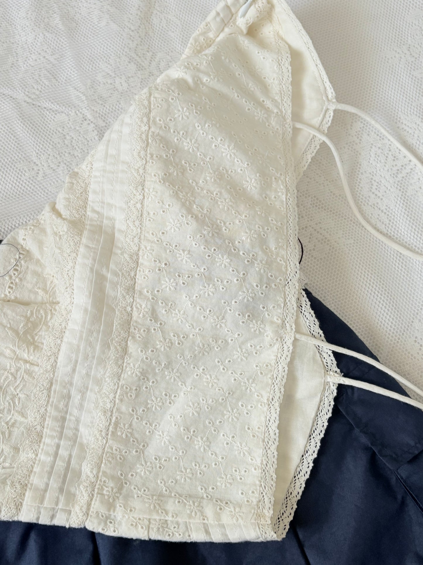 White eyelet top