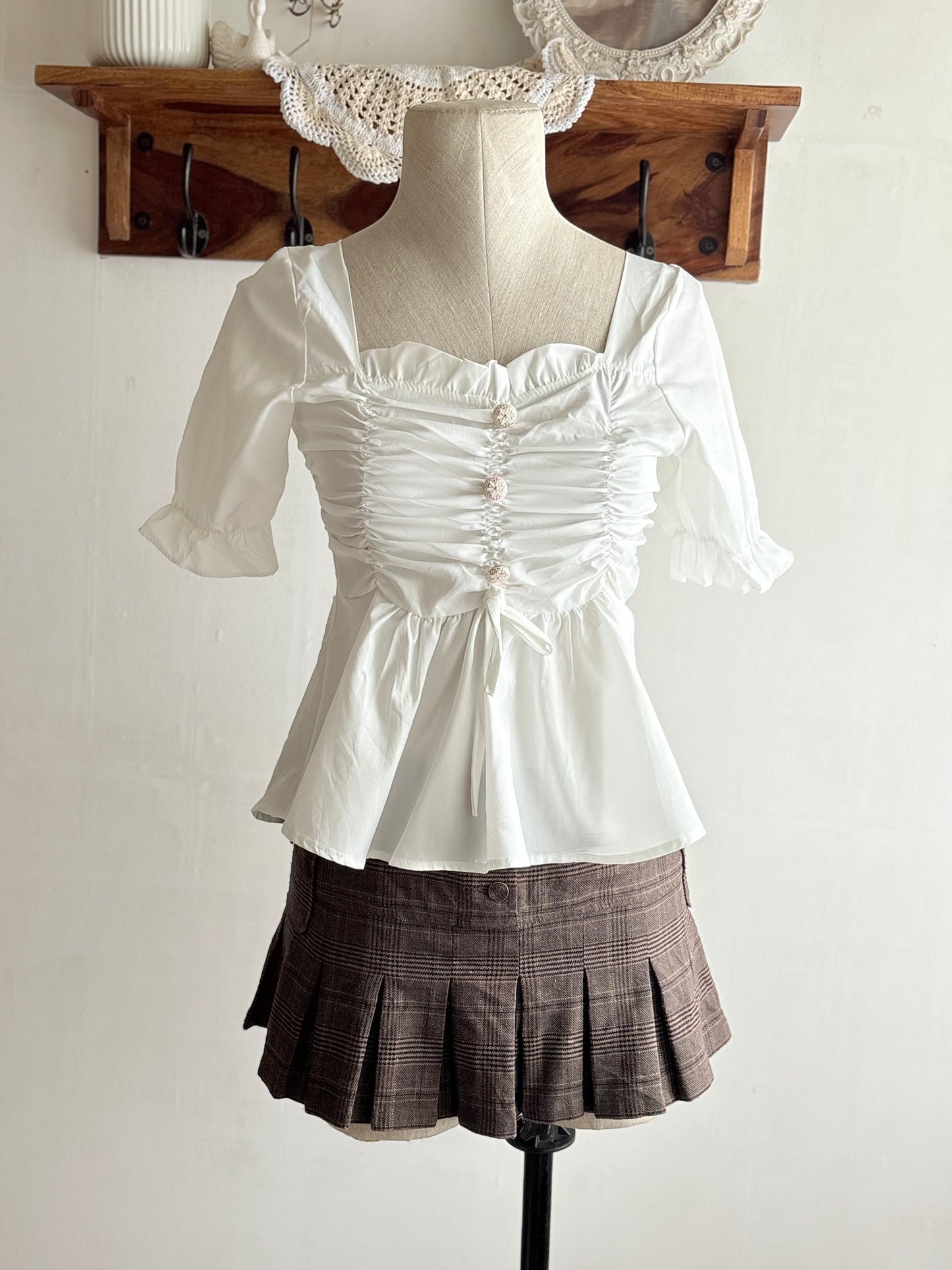 White peplum top