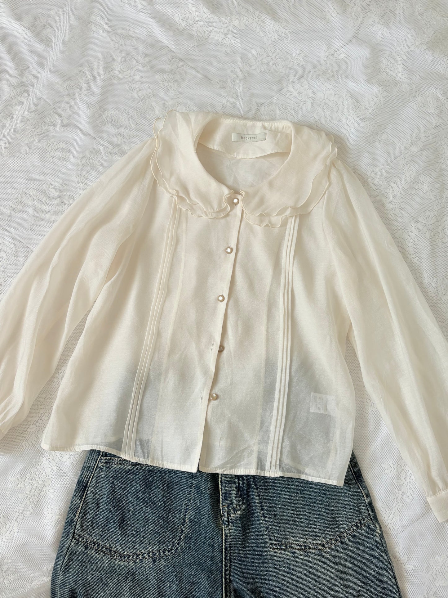 Cream buttoned top