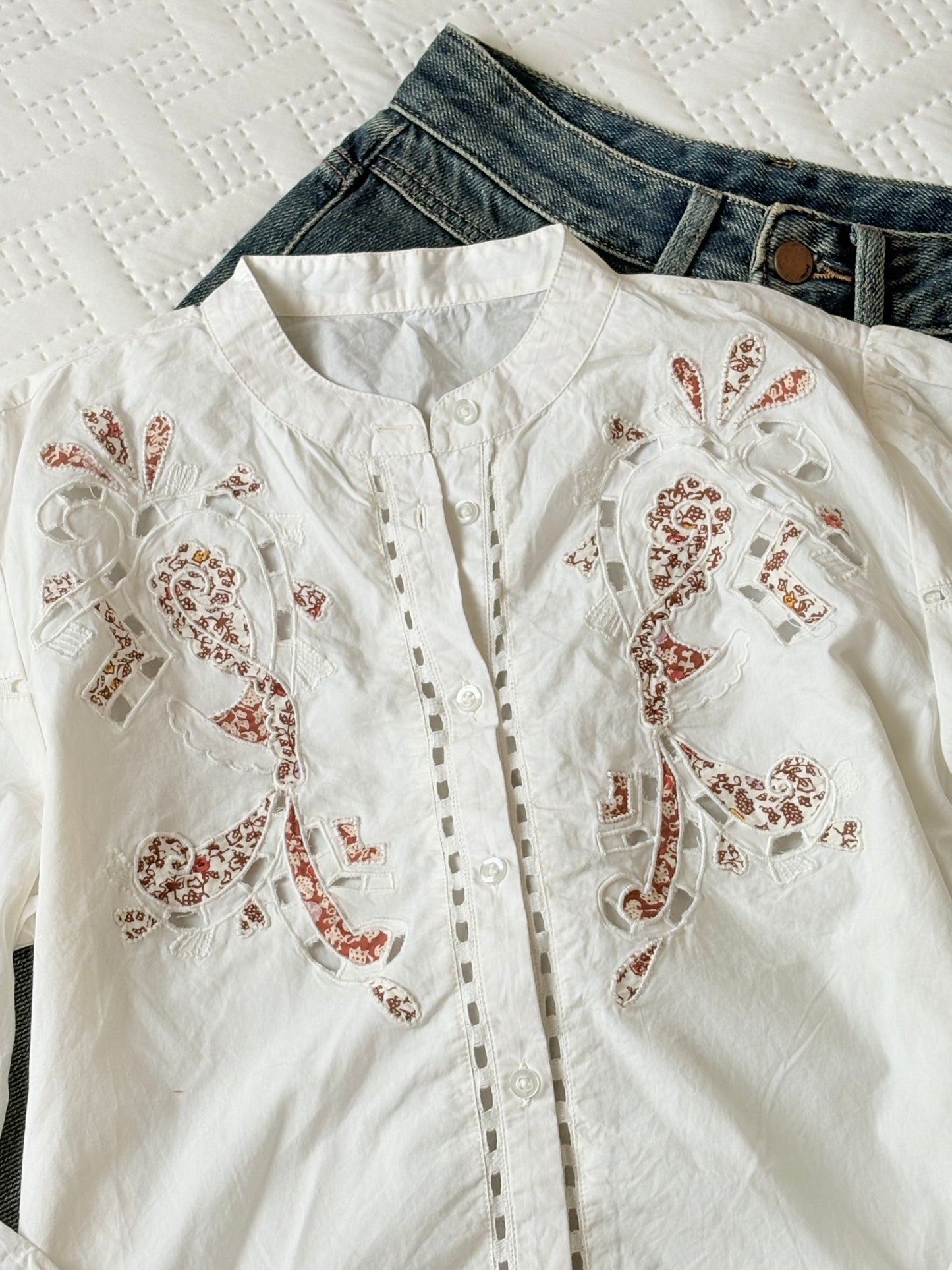 White detailing buttoned down