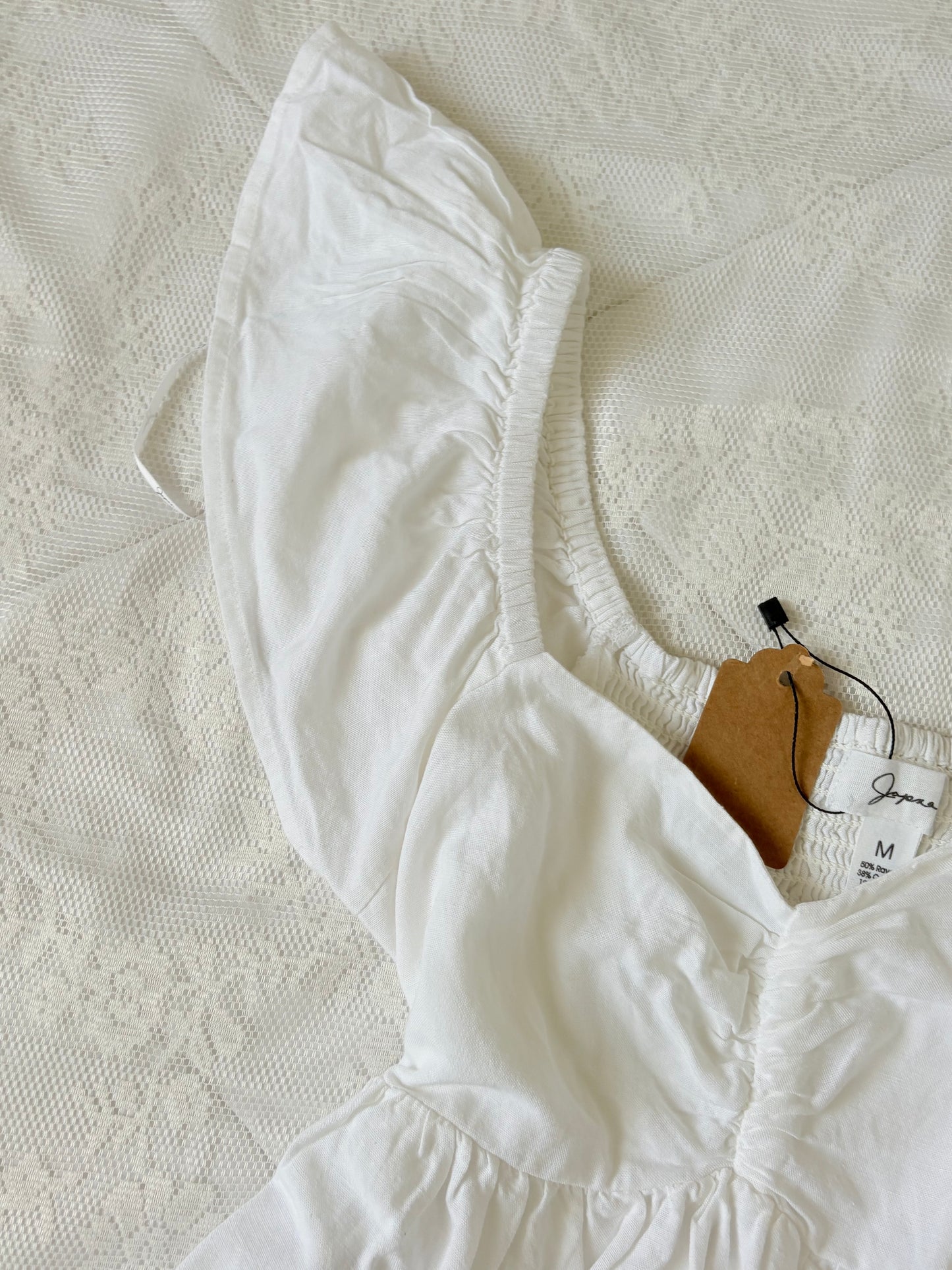 White doll top