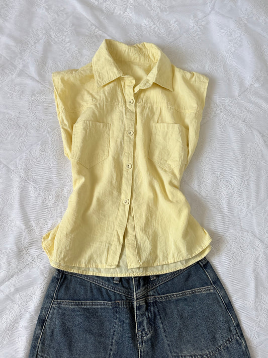 Yellow sleeveless shirt