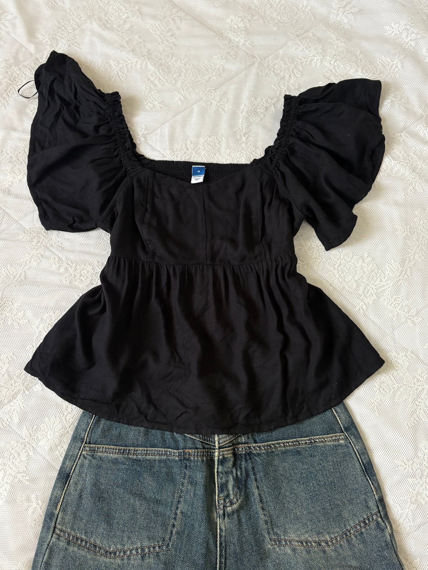 Black doll top