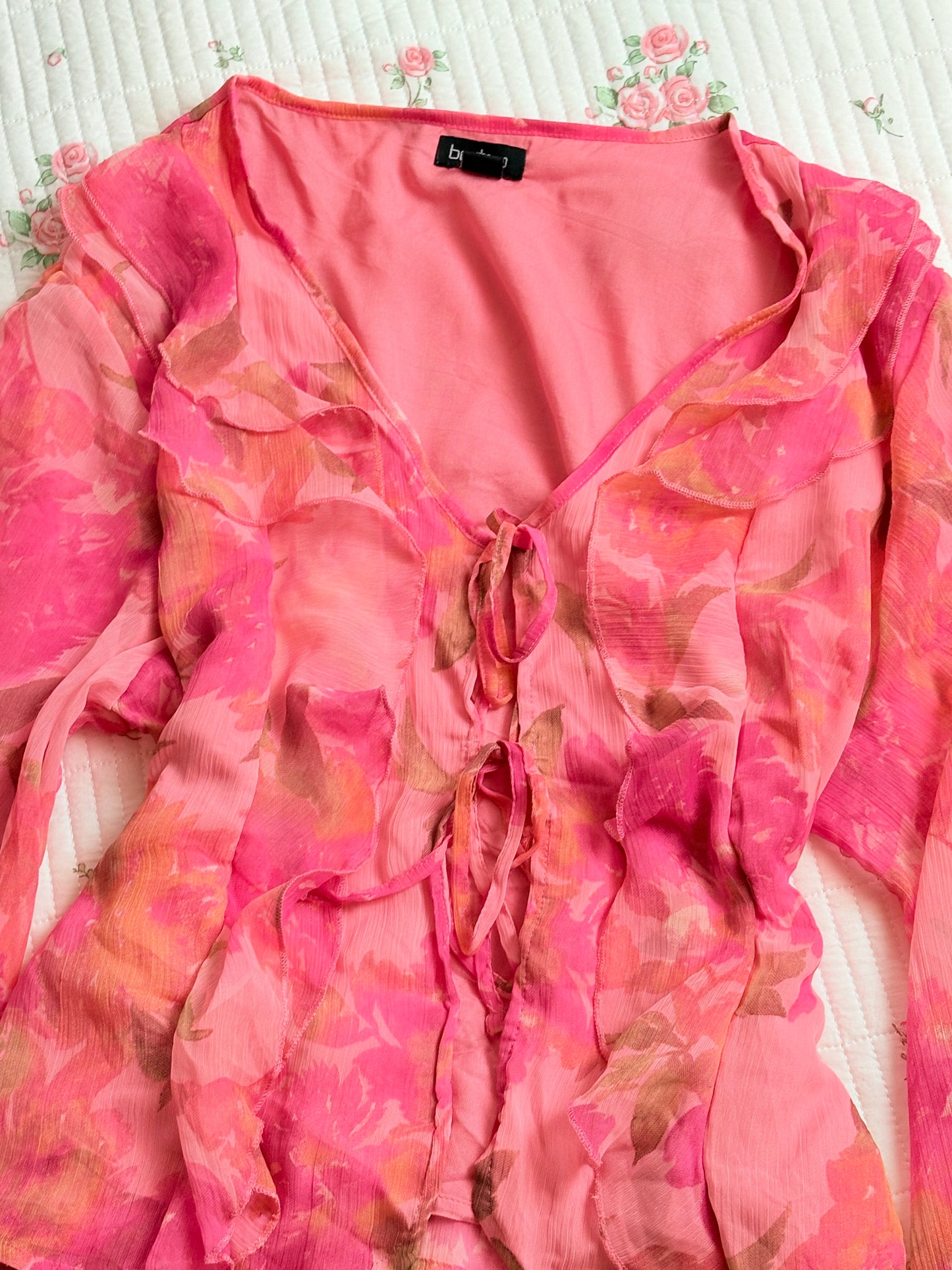 Pink ruffle top