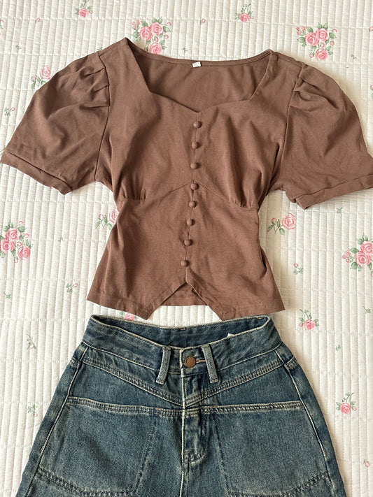 Brown buttoned