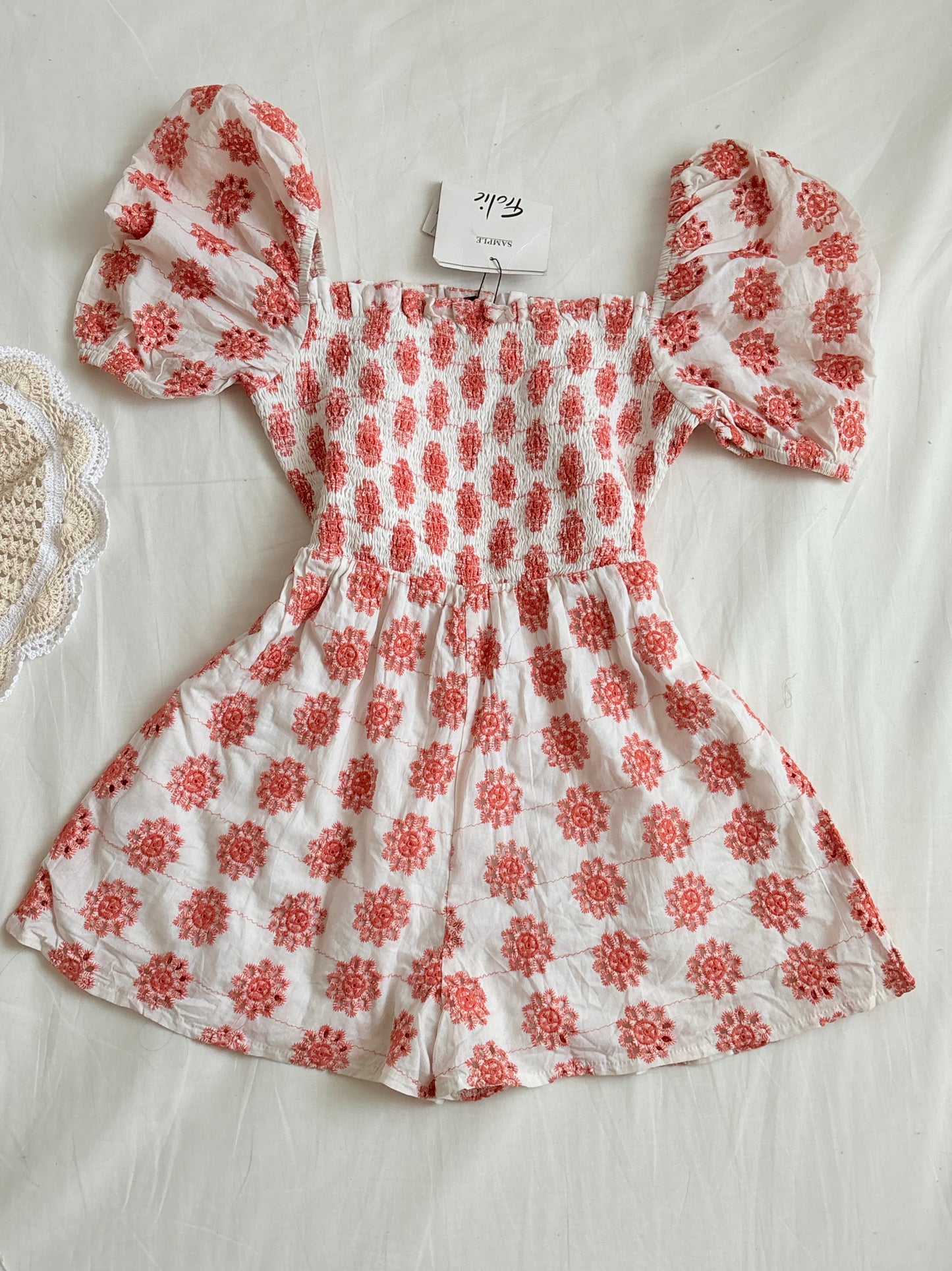 Orange eyelet romper