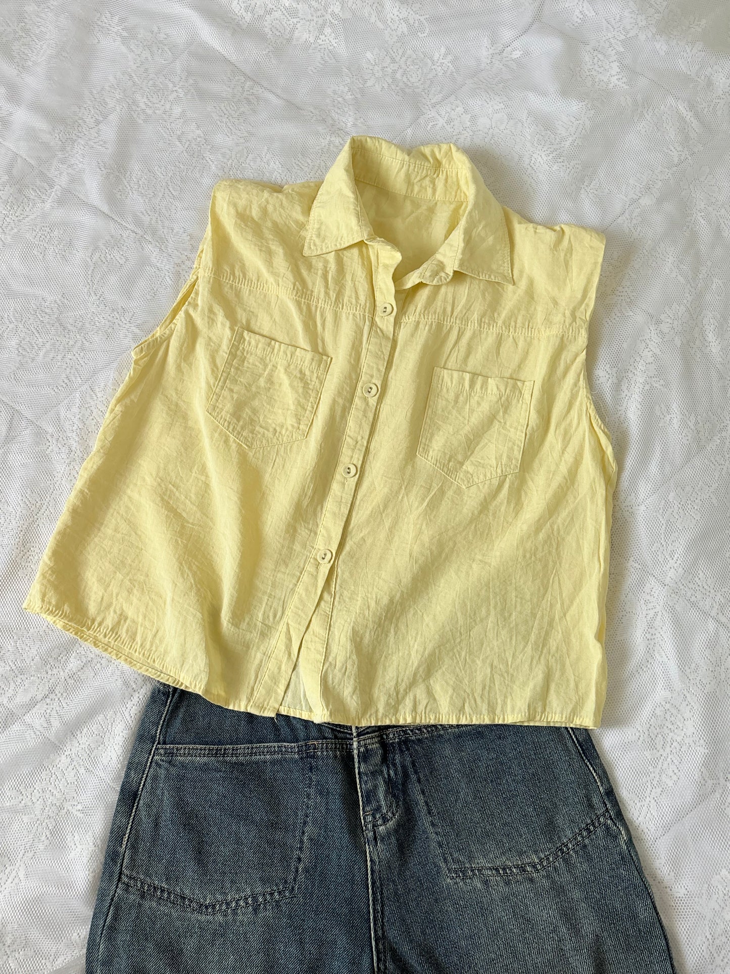 Yellow sleeveless shirt